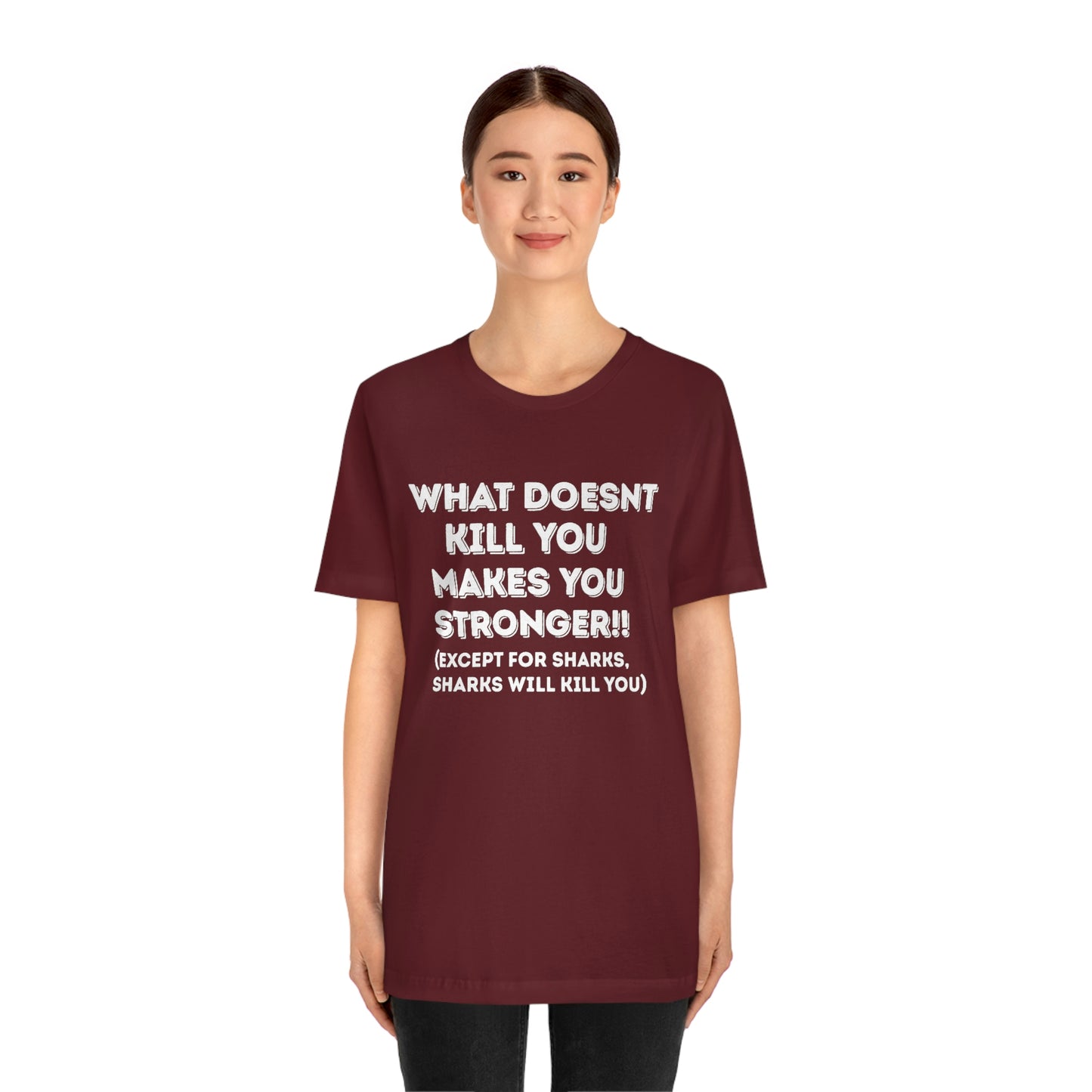 "What doesn't kill you makes you stronger, except sharks, sharks will kill you" - Regular Cotton - Unisex Jersey Short Sleeve Tee (Bella+Canvas 3001)