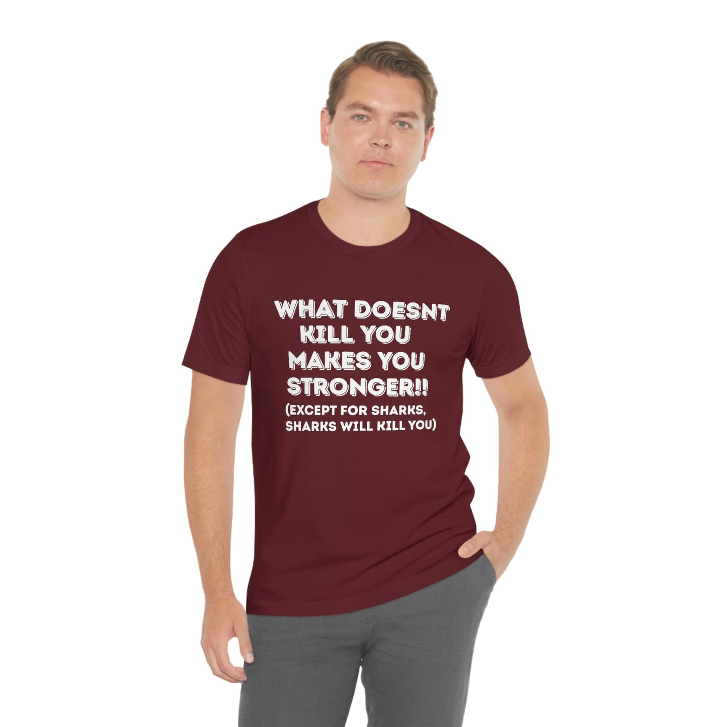 "What doesn't kill you makes you stronger, except sharks, sharks will kill you" - Regular Cotton - Unisex Jersey Short Sleeve Tee (Bella+Canvas 3001)