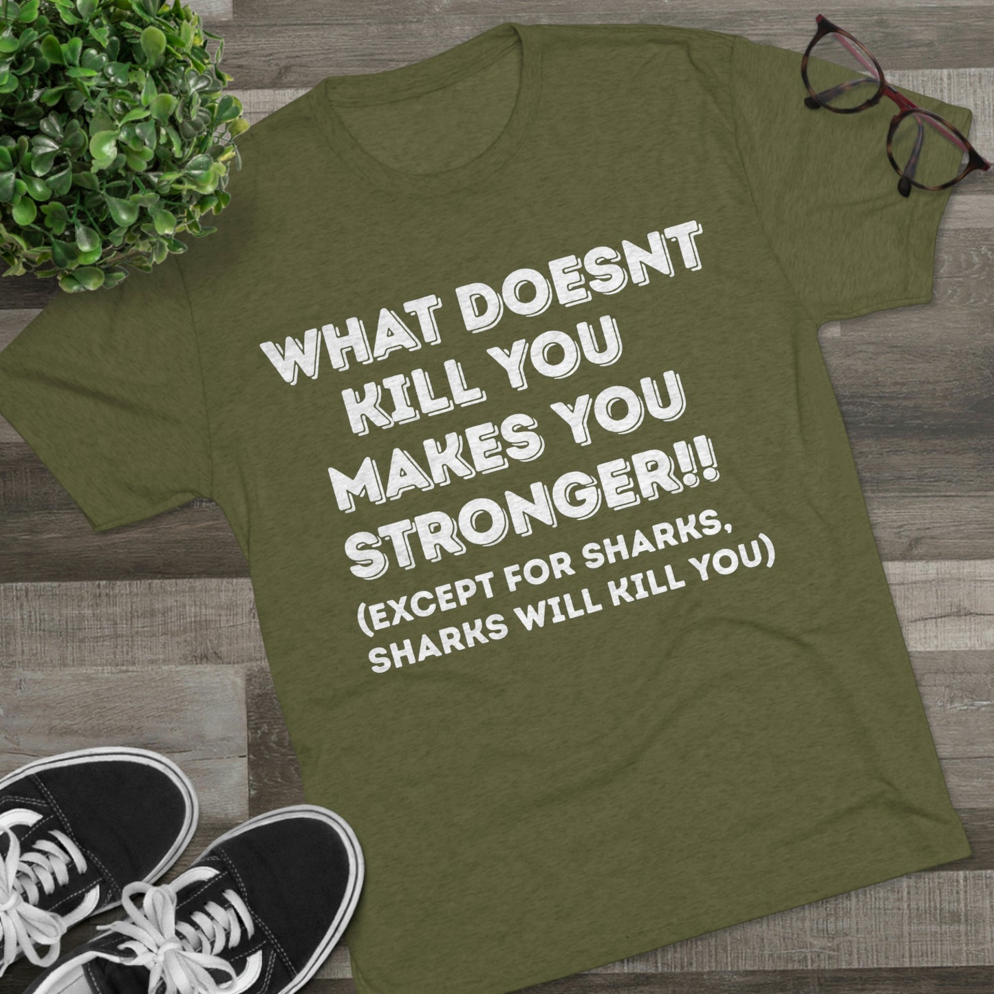 "What doesn’t kill you makes you stronger, except sharks, sharks will kill you" - PREMIUM SOFT - Unisex Tri-Blend Crew Tee (Next Level 6010)